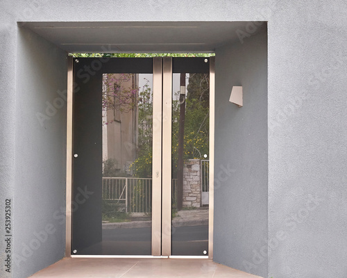 elegant house entrance metal and glass door  Athens Greece