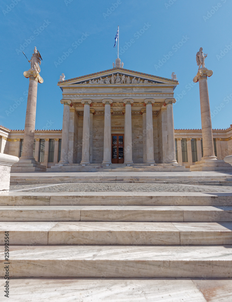 national academy of Athens Greece, main facade with classical columns and Parthenon styled pediment
