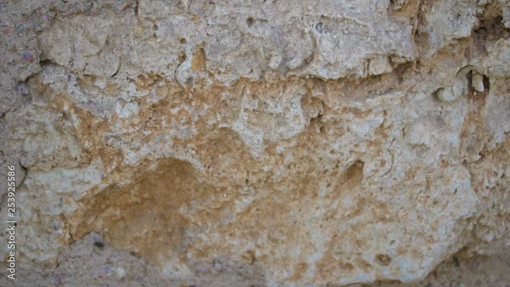 Background of old stone wall texture. Slow motion HD video Background of old stone wall texture. Slow motion HD video