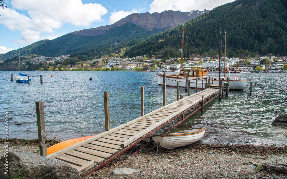 Beautiful scenery view of lake Wakatipu and the waterfront of Queenstown an iconic adventure town in South island of New Zealand.