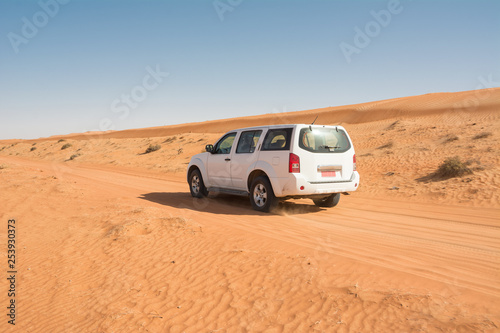 Off-road vehicle on a track in the Wahiba Sand Desert (Oman)