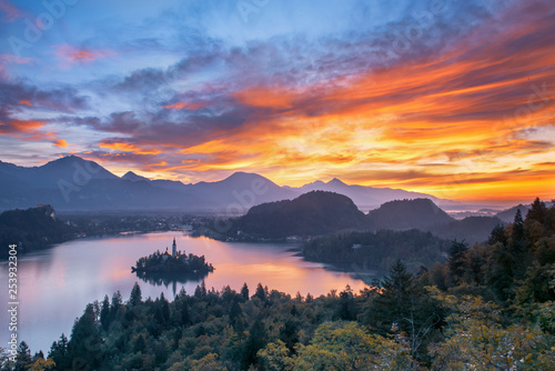 Dramatic sunrise sky over Lake Bled with the view of Village, Slovenia