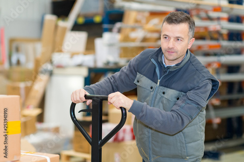 Photos a busy warehouse worker