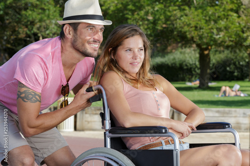 handicapped couple in the park outdoors