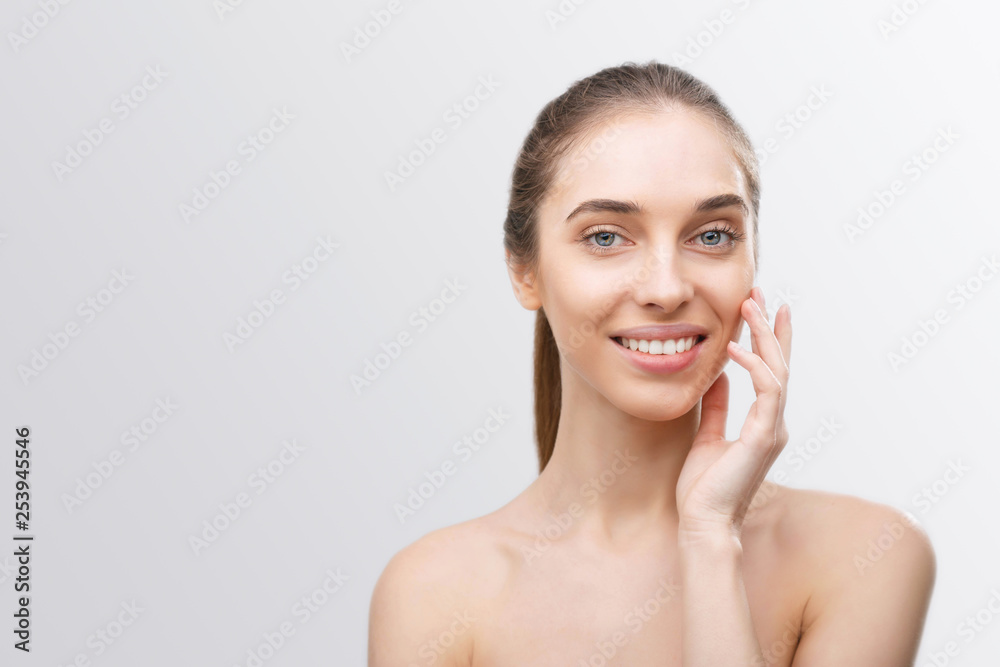 Beautiful woman using a skin care product Beautiful woman using a skin care product