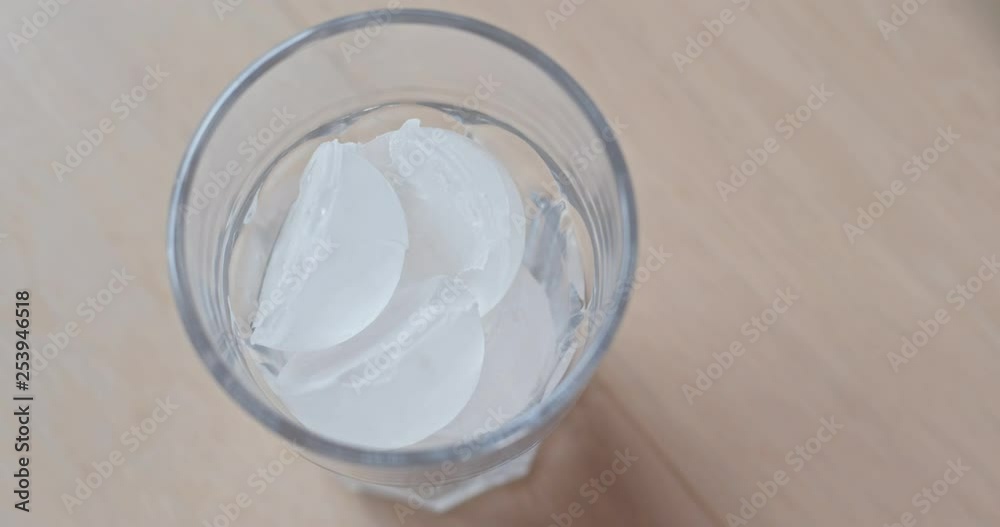 Add hot coffee into glass of ice Add hot coffee into glass of ice