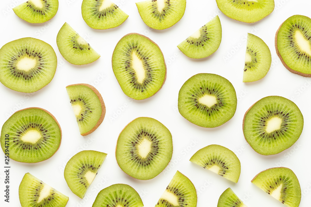 Fototapeta premium Kiwi fruit slices on white background.