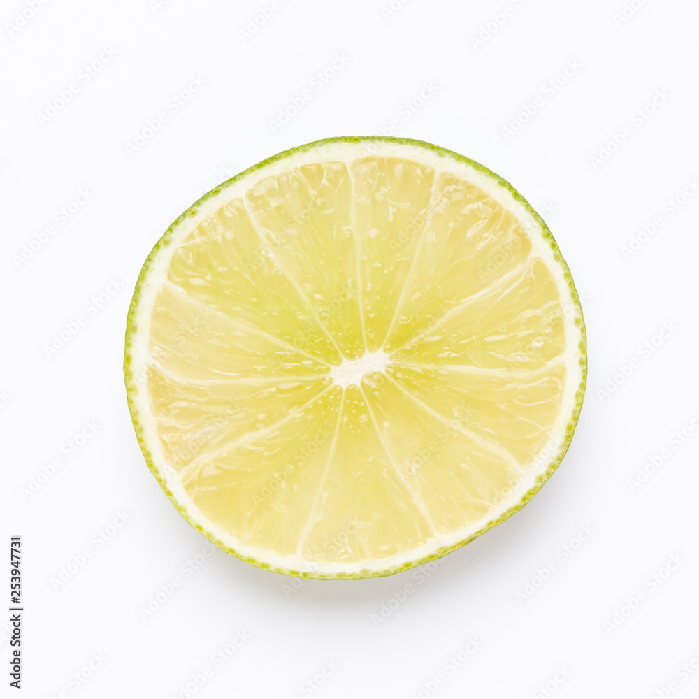 Composition with fresh ripe limes on light background, top view Composition with fresh ripe limes on light background, top view