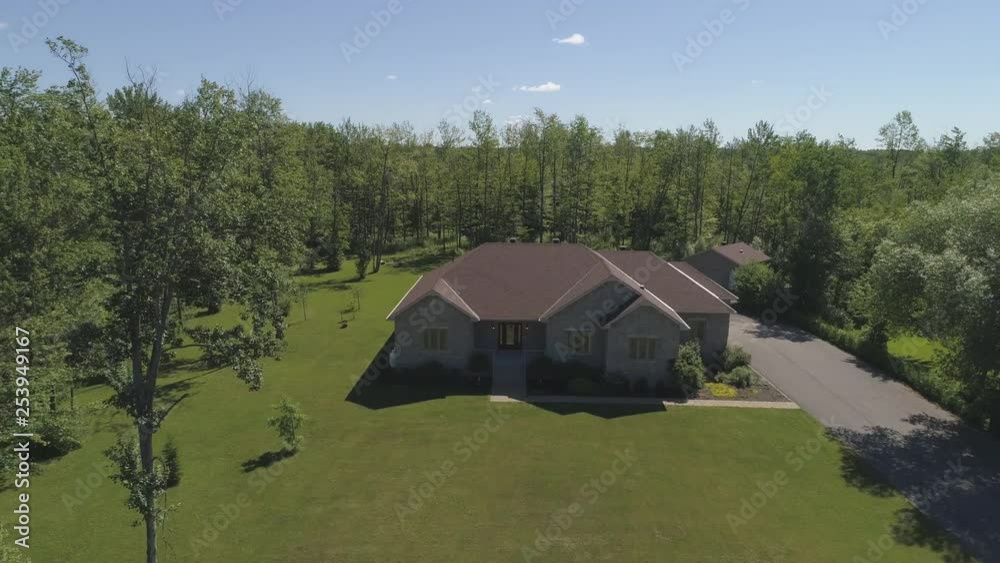 aerial big home surrounded by forest pull back and up to reveal property aerial big home surrounded by forest pull back and up to reveal property