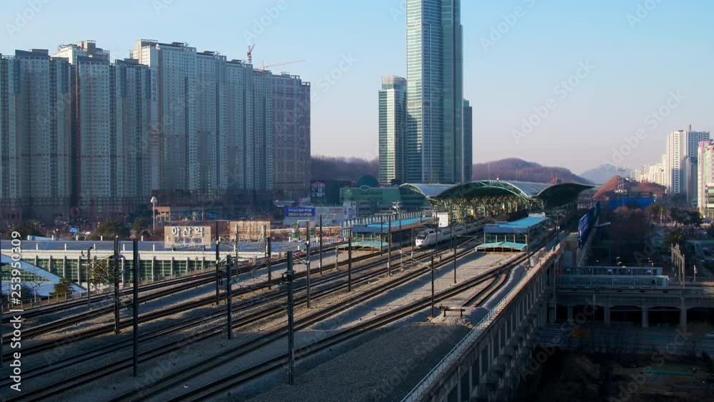 High-speed train departing from the train station