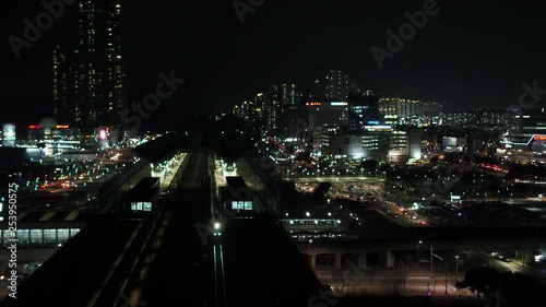Wallpaper Mural Top view of train, High-speed train passing through the station, night scenery Torontodigital.ca