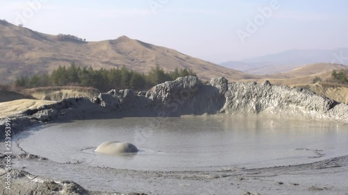 Interesting view mud volcano bubble boiling. Mud Volcanoes stand for one of the most interesting mixed reservations in Europe. Gas Coming Out of the Mud Volcanoes of Methane. Bubbling Mud Pool photo