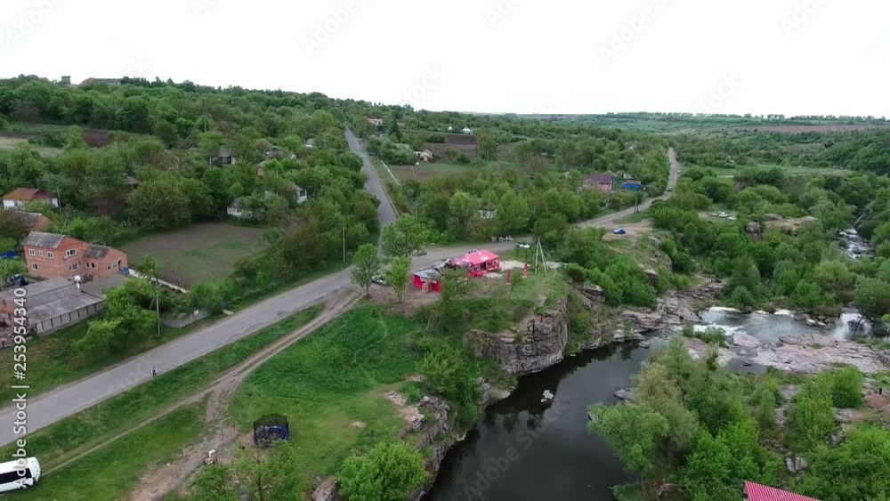 Ukrainian canyon in the village of Buki bird's-eye view. Drone removes from the height of the canyon of the Buka River, white cliffs, meadows, trees. Ukrainian canyon in the village of Buki bird's-eye view. Drone removes from the height of the canyon of the Buka River, white cliffs, meadows, trees.