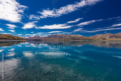 Lake Tekapo with reflection of sky and mountains, New Zealand