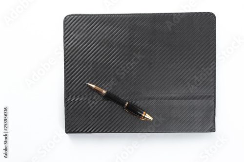 organizer and stylish pen on white background.photo with copy space