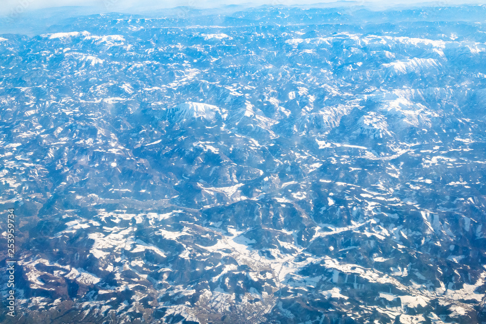 aerial view of Alps mountain from airplane aerial view of Alps mountain from airplane