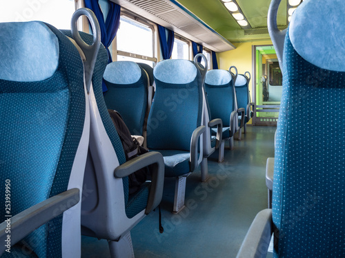 interior of passenger car in regional train photo