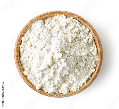 Fototapete wooden bowl of flour