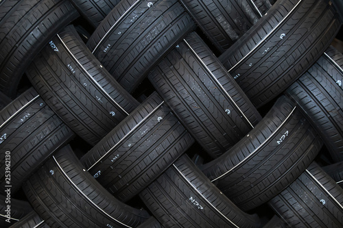 Stack of car tires with shadow deep of view. Great for backgrounds photo