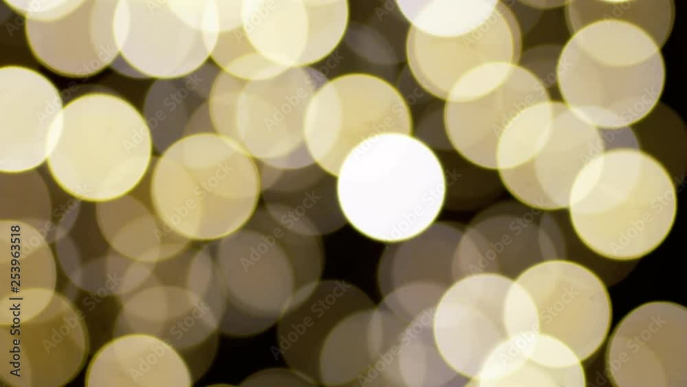 Light yellow blinking bokeh. Blurred background. Out of focus Light yellow blinking bokeh. Blurred background. Out of focus