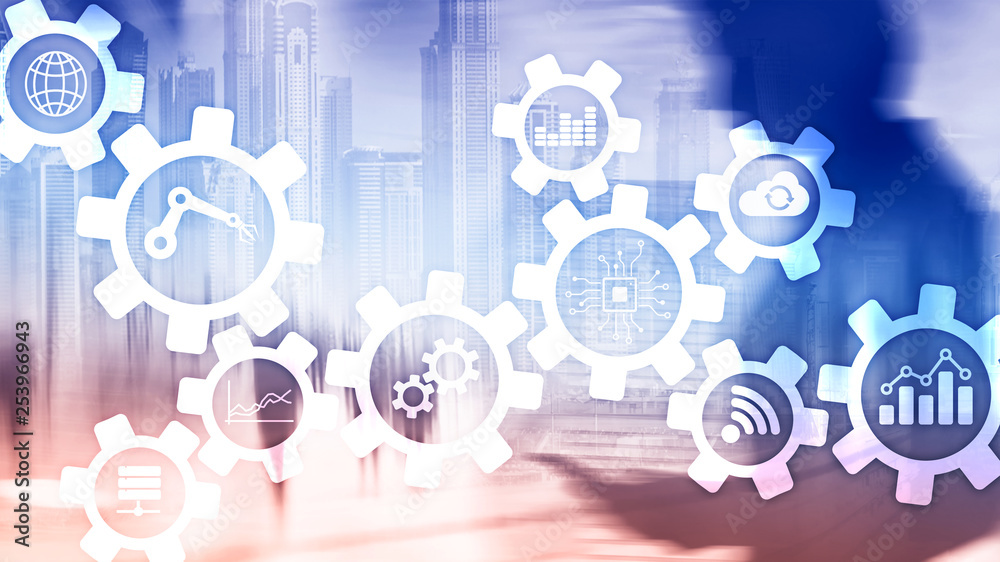 Automation technology and smart industry concept on blurred abstract background. Gears and icons. Automation technology and smart industry concept on blurred abstract background. Gears and icons.