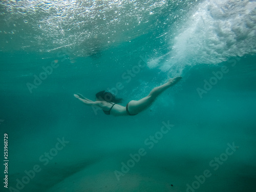 girl swimming underwater 3