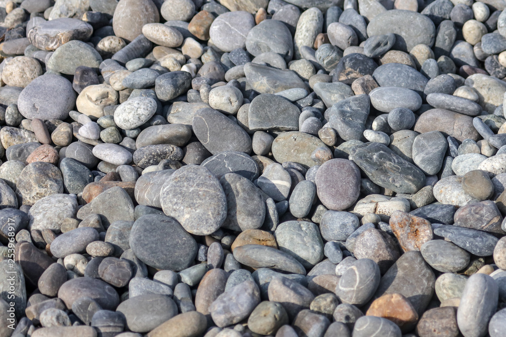 Stone pebbles on the seashore as an abstract background Stone pebbles on the seashore as an abstract background