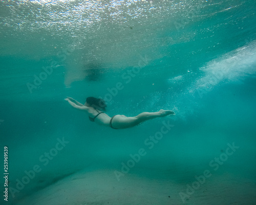 girl swimming underwater 4