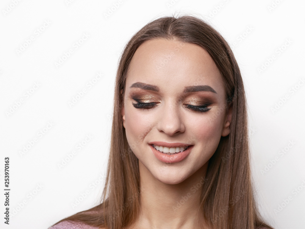 Portrait of beautiful elegant girl with blond hair, trendy styling, beautiful makeup, glossy, smooth skin posing for makeup artist social network portfolio Portrait of beautiful elegant girl with blond hair, trendy styling, beautiful makeup, glossy, smooth skin posing for makeup artist social network portfolio