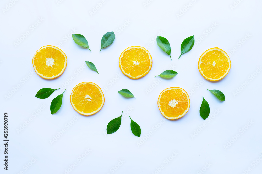 Fresh orange citrus fruit with leaves isolated on white. Fresh orange citrus fruit with leaves isolated on white.