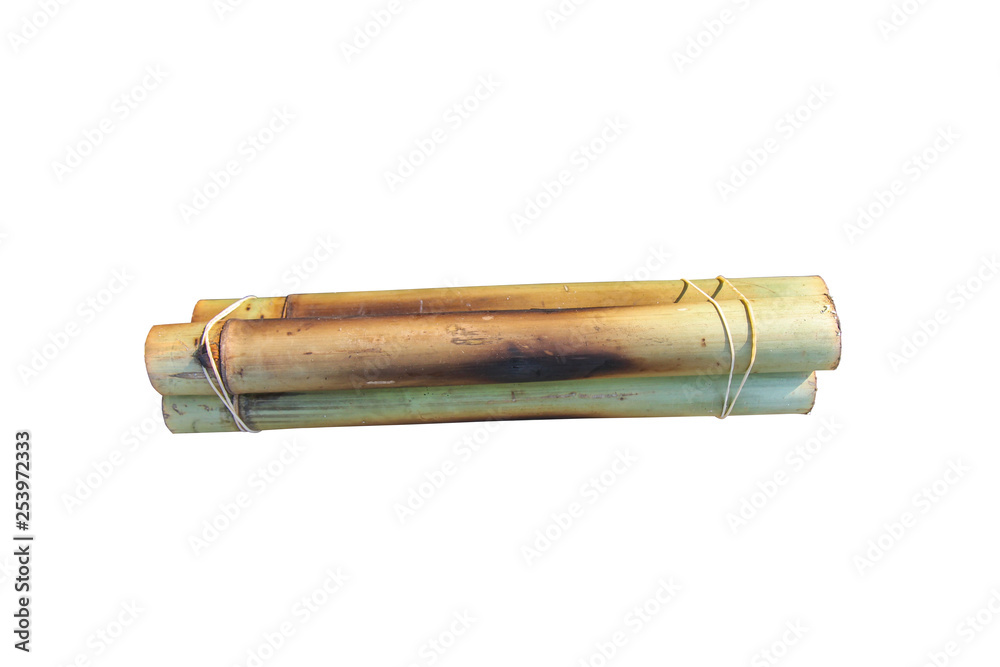 Thai street food, Thailand dessert, Glutinous rice roasted in bamboo isolated on white background with clipping path Thai street food, Thailand dessert, Glutinous rice roasted in bamboo isolated on white background with clipping path