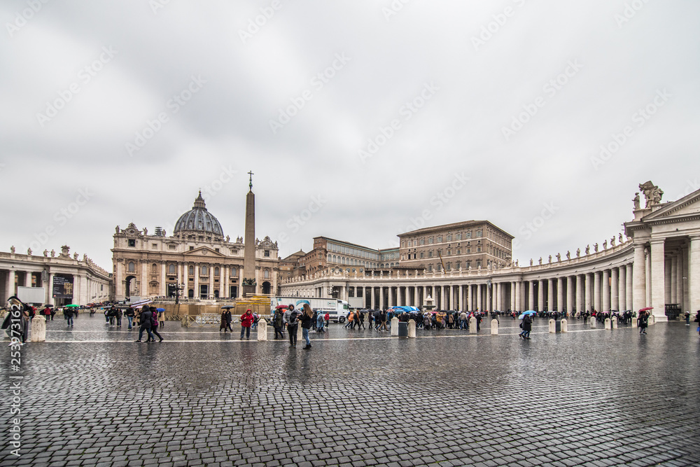 VATICAN CITY - November, 2018: St. Peter's square in front of world's largest church. Papal Basilica of St. Peter's a grandiose elliptical esplanade created in the mid seventeenth century.