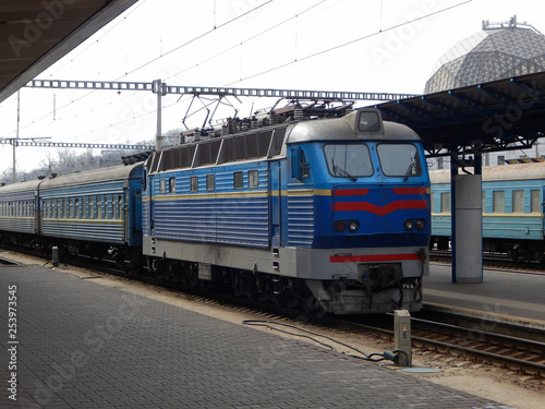 Electric Train Arrival To Platform Of Passenger Railway Station 