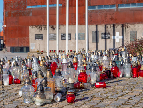 Hundreds of candles, lanterns at the Solidarity Square with European Solidarity Center in the back, in Gdansk, Poland