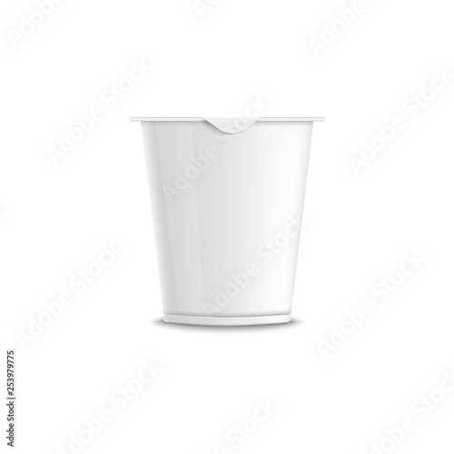 Empty clear white plastic triangular yogurt containers with closed lid and cap.