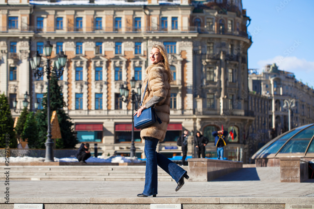 Young beautiful woman in winter coat