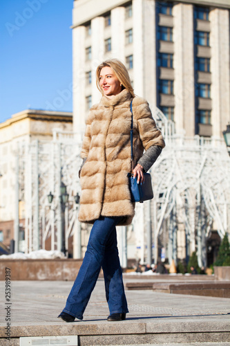 Young beautiful woman in winter coat