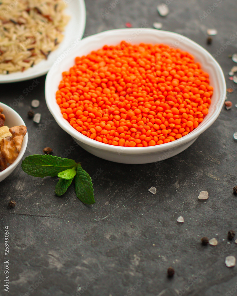 Lentils orange, healthy food concept (legumes, greens, spinach, micro greens and more) superfood. Food background