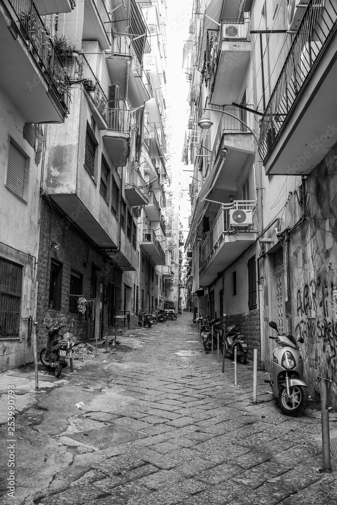 Naples, Italy - August 09, 2015 : Narrow streets of Naples, black and white photographs.