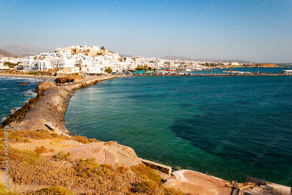 The bay of Naxos in Greece in the front, the city in the background
