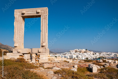 The Apollo Temple on the island Naxos in Greece in the front, the city in the background