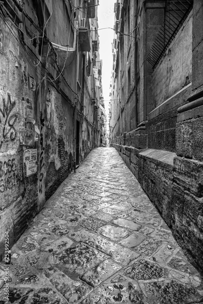 Naples, Italy - August 16, 2015 : Narrow streets of Naples, black and white photographs. Naples, Italy - August 16, 2015 : Narrow streets of Naples, black and white photographs.