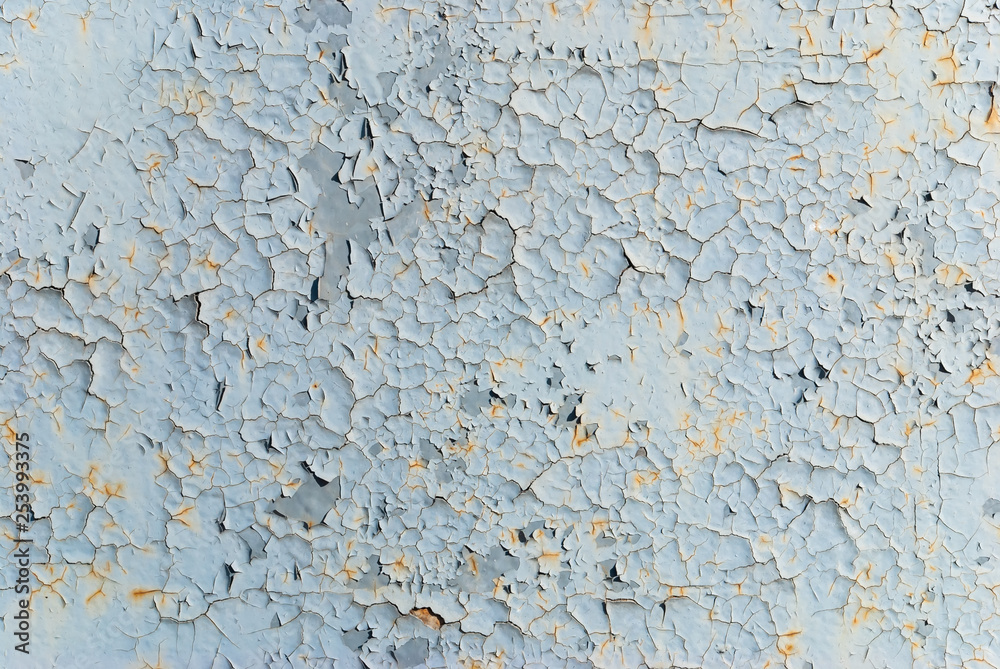 metal wall with cracks from paint. old wall background. metal wall with cracks from paint. old wall background.