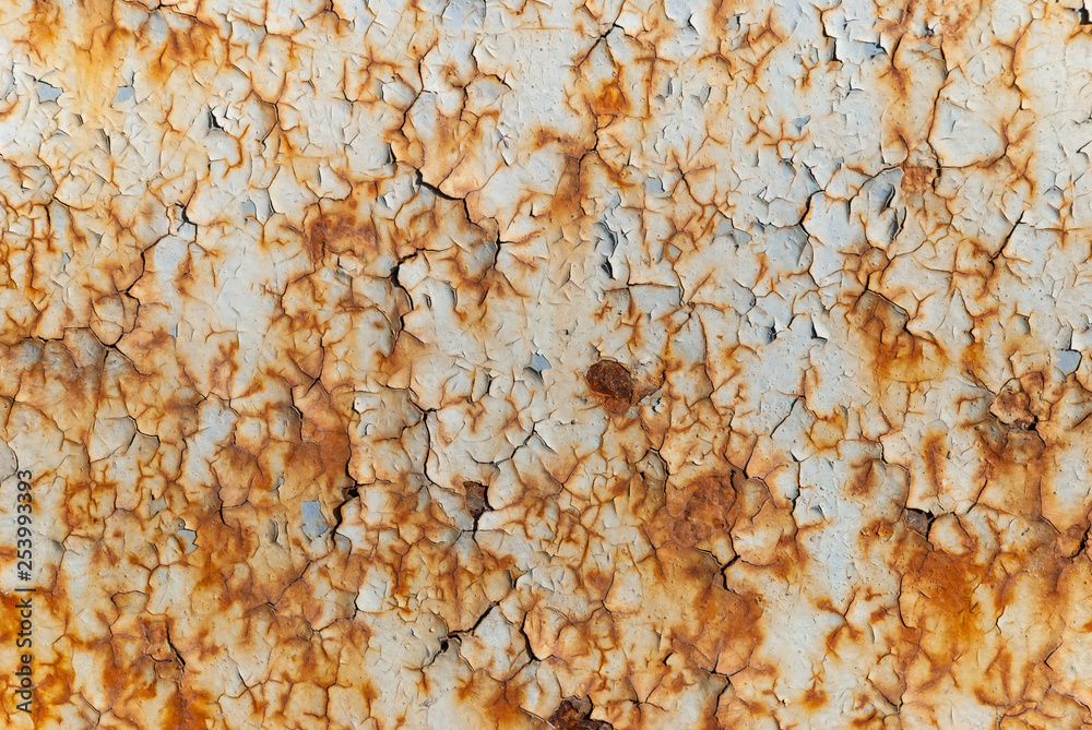 metal wall cracked with paint and rust. old wall background. metal wall cracked with paint and rust. old wall background.