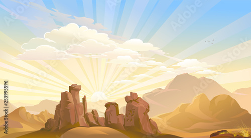 Sunrise above the ancient desert mountains.