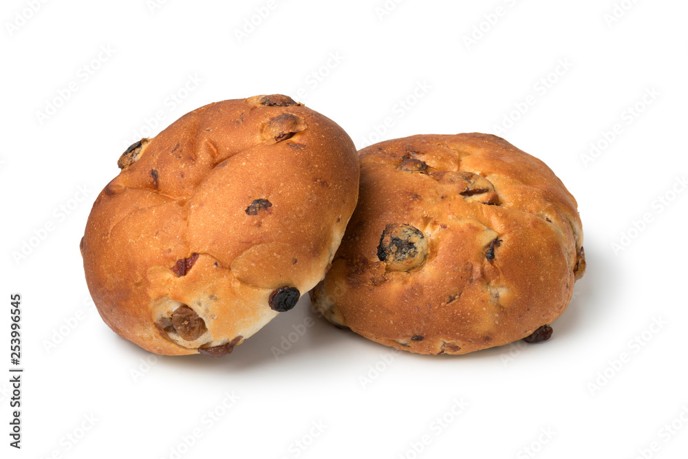 Pair of fresh baked raisin buns Pair of fresh baked raisin buns