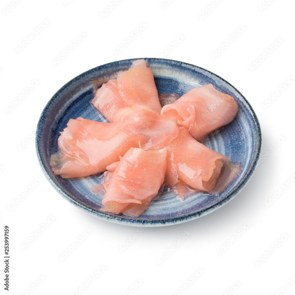 Pink pickled sushi ginger slices in bowl Pink pickled sushi ginger slices in bowl