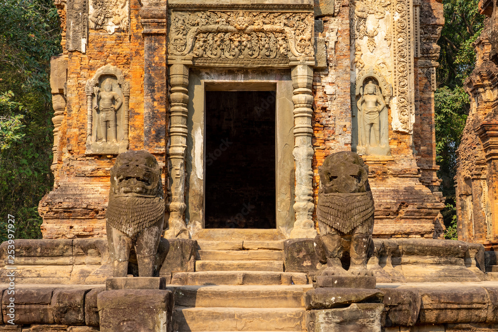 Preah Ko temple, Cambodia: door to sanctuary with carvings
