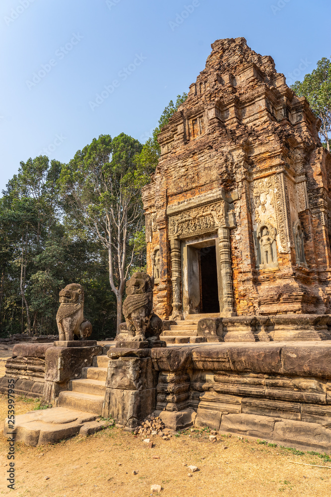 Preah Ko temple, Cambodia: Sanctuaries and khmer style guardian lions sculptures.