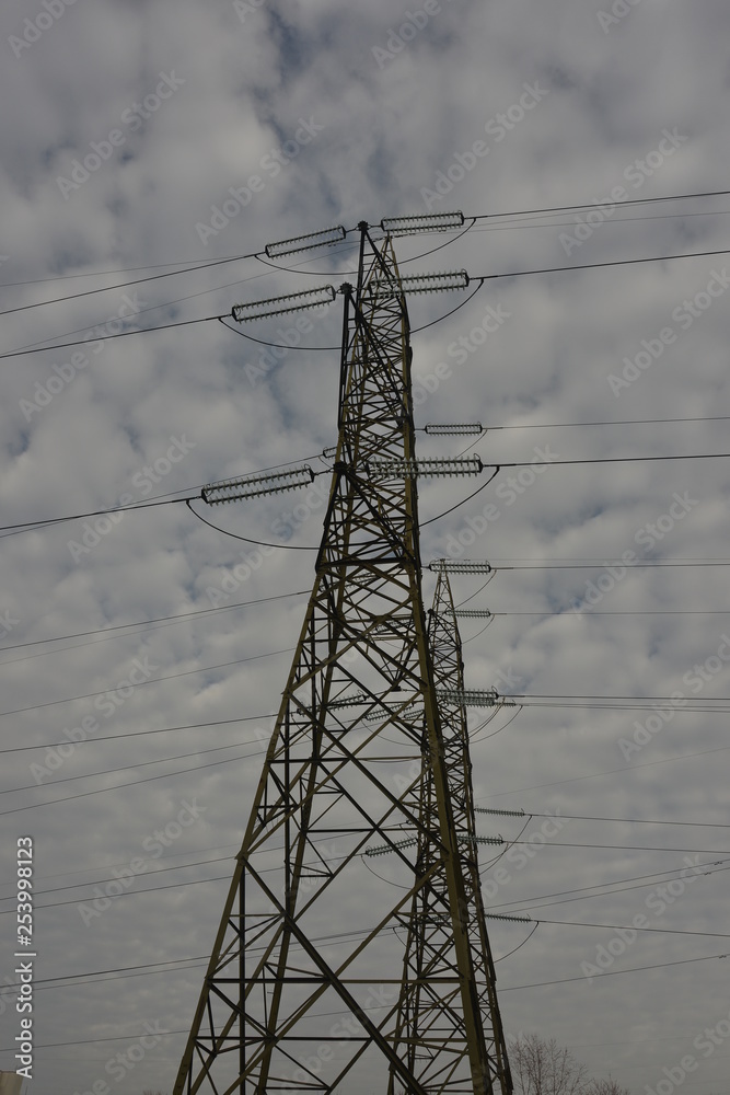power transmission tower on background of blue sky